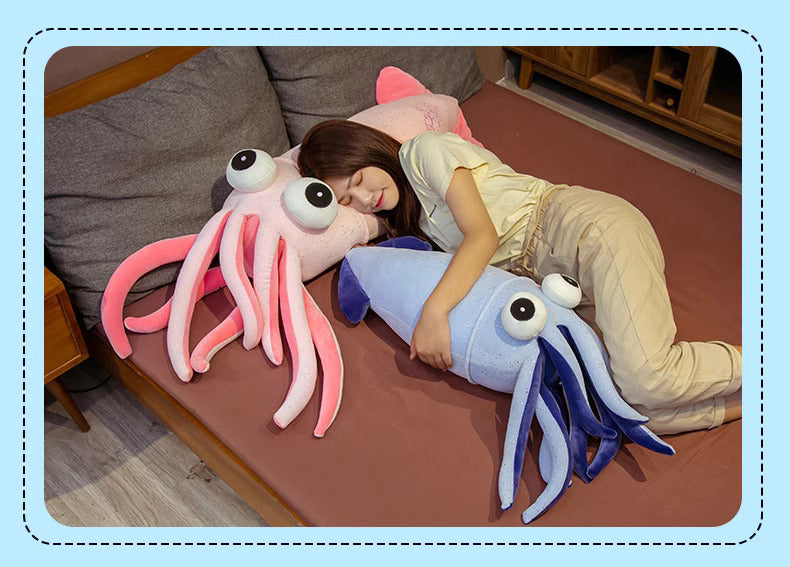 Blue or pink squid plush