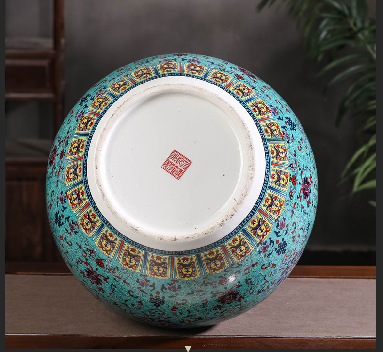 Green vase with yellow trim