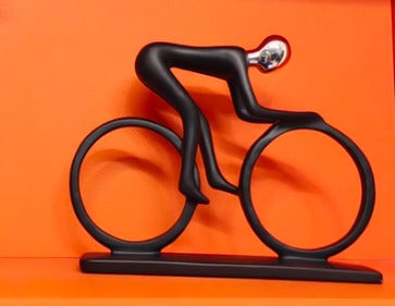 Man riding bicycle sports bike sculpture