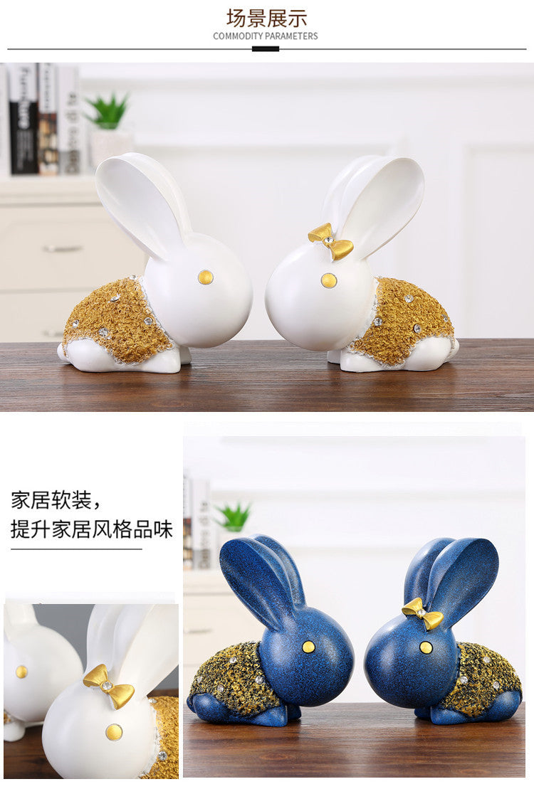 Twin blue rabbit sculpture