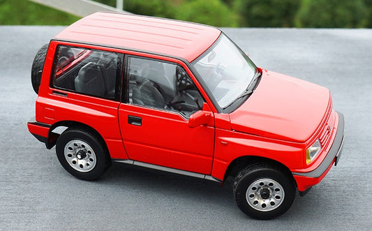 Model Name: 1-18 Suzuki Vitra Alloy Car Model  Material: alloy, plastic, rubber Colour: red or black or white Model scale: 1:18 Model Size:210mm * 100mm * 90mm