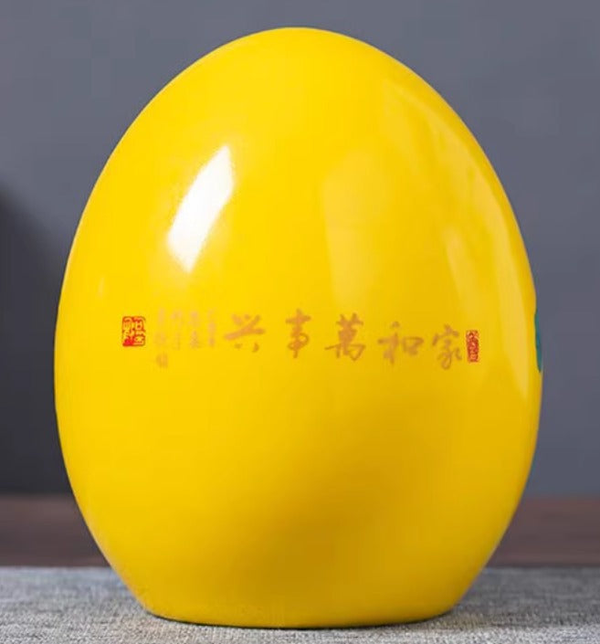 Jingdezhen ceramic egg with yellow and blue designs